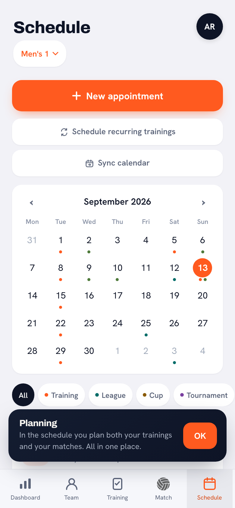 The month view of the team calendar in Koach with trainings, matches and, in between them, a one-off event with a grey-blue label